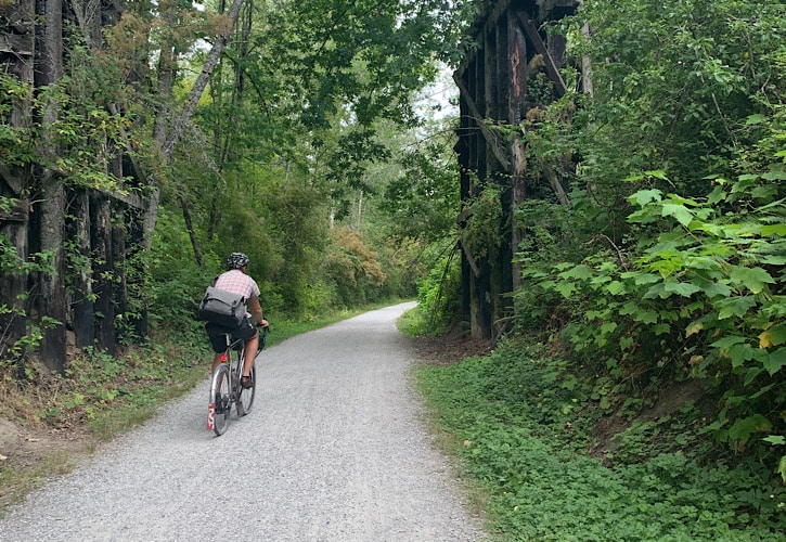 Man riding a bike on the interurban trail in Bellingham.