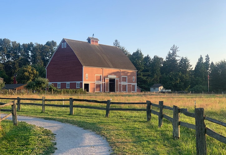 Red Barn and a split rail fence at Hovander park in Ferndale.